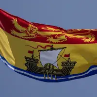 Truck carrying mail, milk and alcohol to isolated N.B. island held at U.S. border