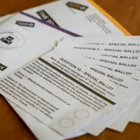 Some referendum questions flip to 'no' as the count continues in Alberta