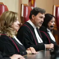 Chief justice stresses need to protect democratic institutions as pressures grow