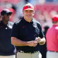 Georgia-Alabama showdown is on schedule despite arrival of Hurricane Isaias; Trump will skip game
