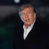 The Latest: US ties with Ukraine hit a new low as Trump slights Zelenskyy and eases up on Russia