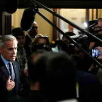 Albertans have voted ‘yes’ to referendum questions on immigration. Here’s how Carney responded.