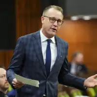 Senior Tory accuses Liberals of fuelling ‘harassment’ of Conservative MPs amid floor-crossing rumours