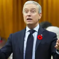 Carney government reduces savings targets for some departments, agencies