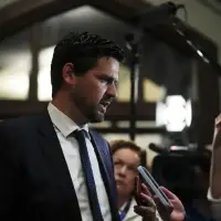 Liberals taking 'fresh' look at online harms bill, justice minister says