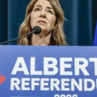 Alberta premier wins standoff with party over position on provincial separation vote