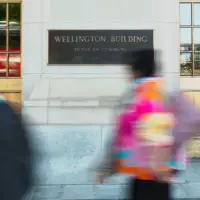 ‘100 per cent of my in-office day is spent working virtually’: public servants describe uneven return to office