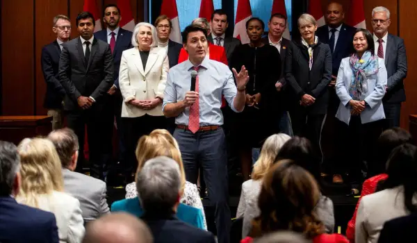 Trudeau tells Grit MPs not to expect any dramatic boost in public support until next year