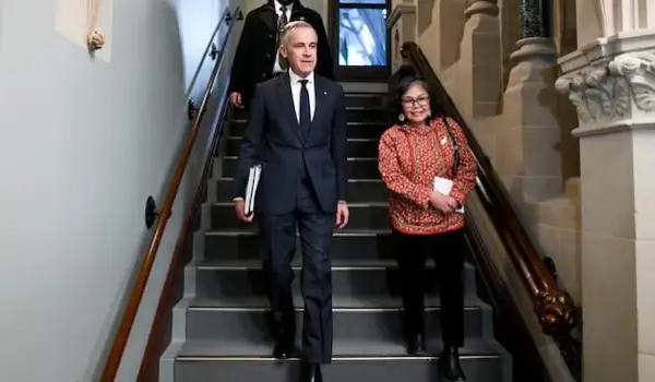 Liberals are elated while Poilievre accuses Carney of ‘backroom deals’ after NDP defection