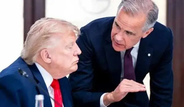 Hot mic moment at G7 catches Carney, Trump talking about Chinese EVs